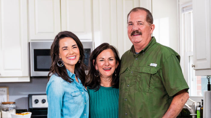 Photo of Mary with John and their daughter, Whitney