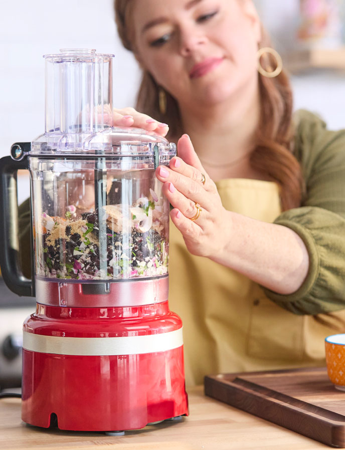 Alicia using a food processor