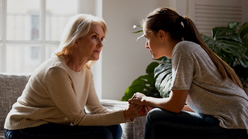 Two women comforting each other Two women comforting each other